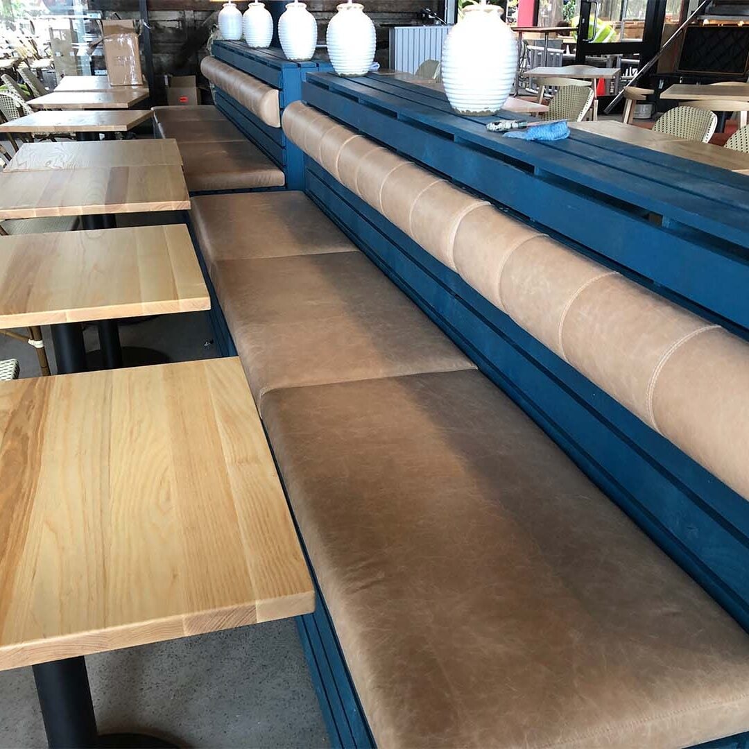 Commercial upholstery — café banquette in tan leather